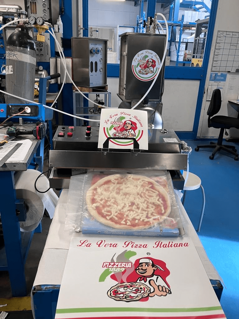 Immagine miscelatore per il confezionamento in atmosfera protetta con pizza